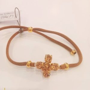 Pulsera cruz marro clarito